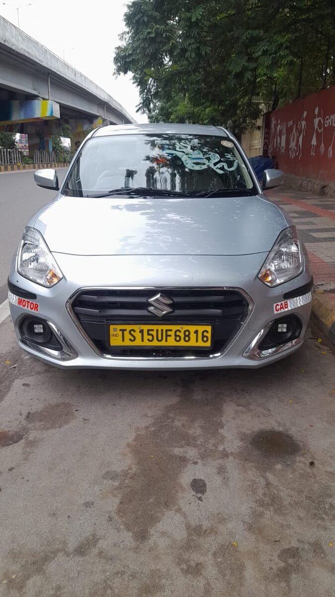 Swift Dzire sedan from our Hyderabad cab fleet